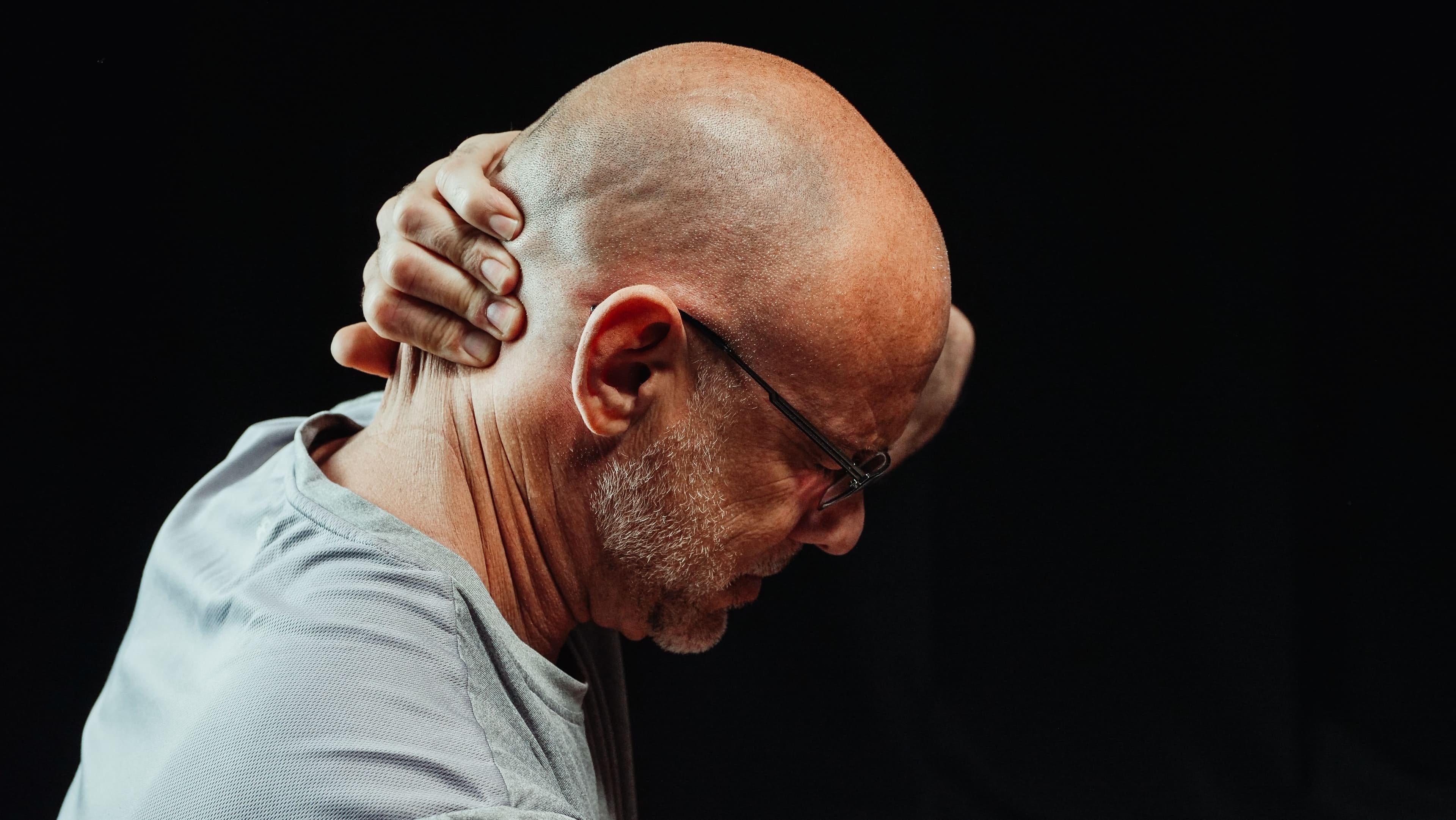 Physiotherapist treating a patient's back pain